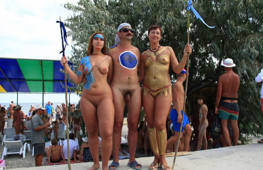 Three Painted Girl Poses pics - Overcoming inhibitions is one of the goals of nudism