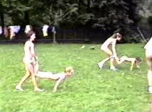 A nudist gathering at the stadium and sports - Nudism and natural harmony