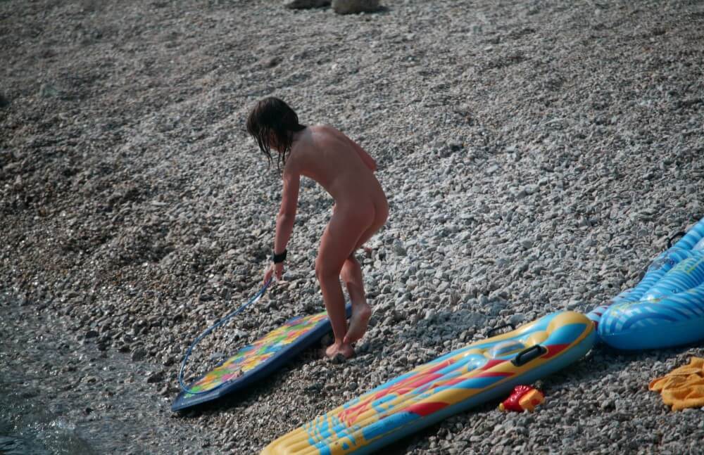 Naturist Surf Board Glides pics - Nudism teaches you to appreciate the present