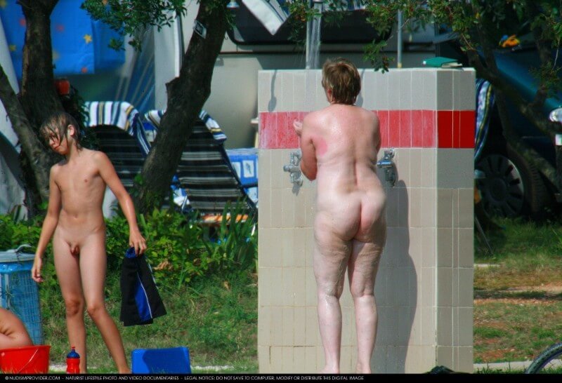 Covered in Towel Nudists-Boardwalk Biking - Living in harmony and tranquility is the primary goal of naturists and nudists