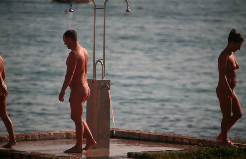 Naturist Shower at Dusk pics - Nudity is only possible among people