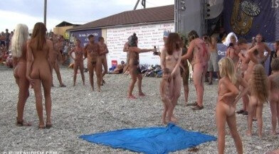 Cool Day At The Beach Full HD video - Nudists relax beautifully—a sight to behold