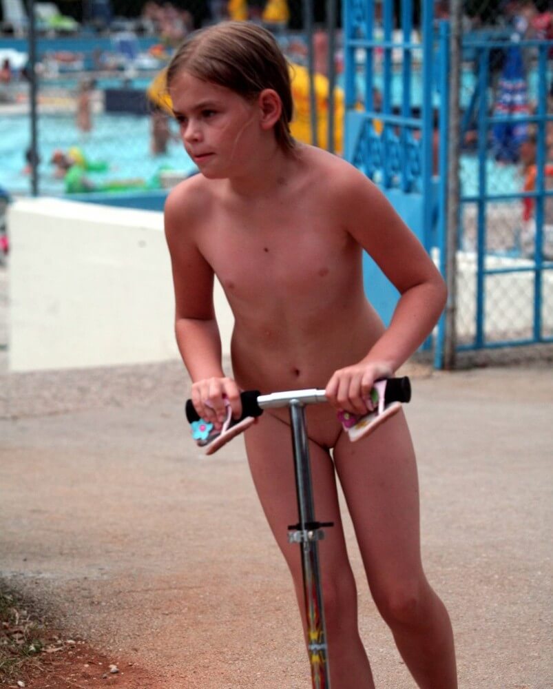 Pool-Side Naturist Scooter pics - Unrestricted freedom is a core value in nudism and naturism
