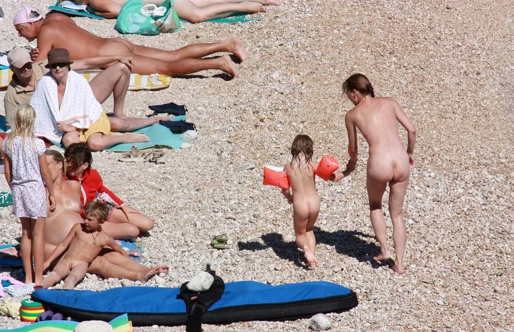 Orange Floaty Safety First Naturist pics - Travel and tours incorporating elements of the naturist lifestyle